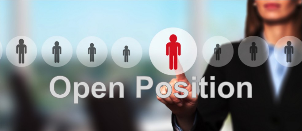 Open position: woman in business attire in office